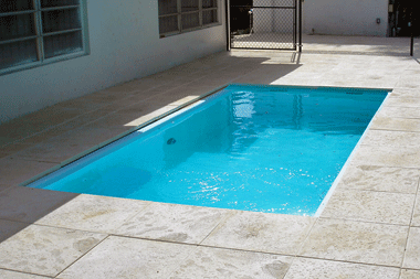 Blue fiberglass pool shell Copano Pools and Spas